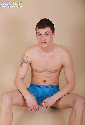 Cute tattooed boy Robin Hunter busts his nut. by BoyFun image 6