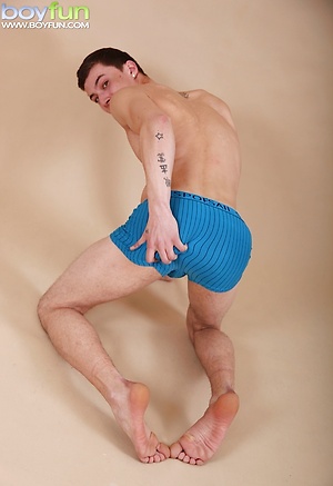 Cute tattooed boy Robin Hunter busts his nut. by BoyFun image 7