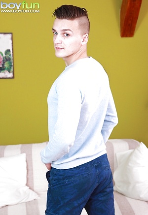 Tattooed Dom Ully busts a big nut over his stomach. by BoyFun image 2