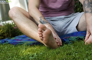Joshua Czech lays a blanket down outside and busts a nut.