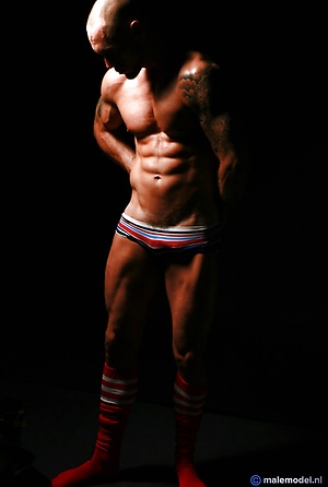 showing his muscles by Male Model image 4