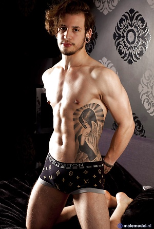 Marco showing his body on balcony