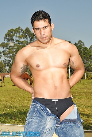 Gay stallion Alexander Senna strips & shows his muscular body by the river by Jalif Studio image 5