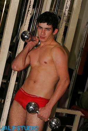 Gay brunette Gibson shows his hard dick & nice booty while lifting weights