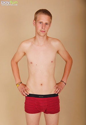 Twink Zack Kane spreads his asshole wide apart.
