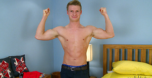 Muscular blonde hunk Harry sShows off his body